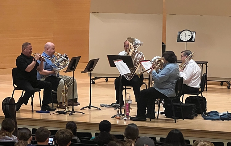 Members of the Clarion Brass Group During a Concert