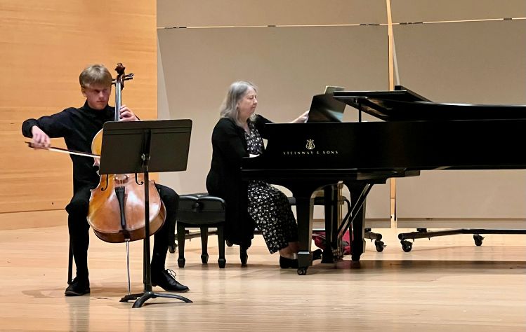 Cello student playing with piano accompanist