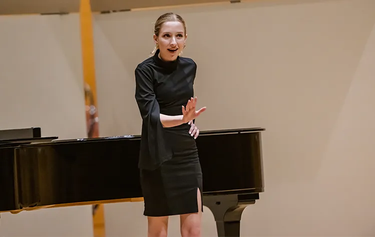 Emma Wittenauer performs onstage.