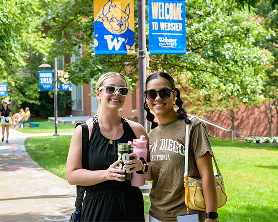 Students pose for a photo in the Quad.