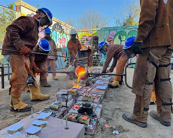 Art students cast designs