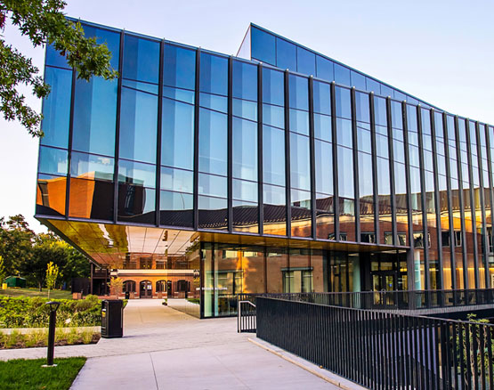 Browning Hall, a modern building surrounded by windows, located on the Webster Groves campus.