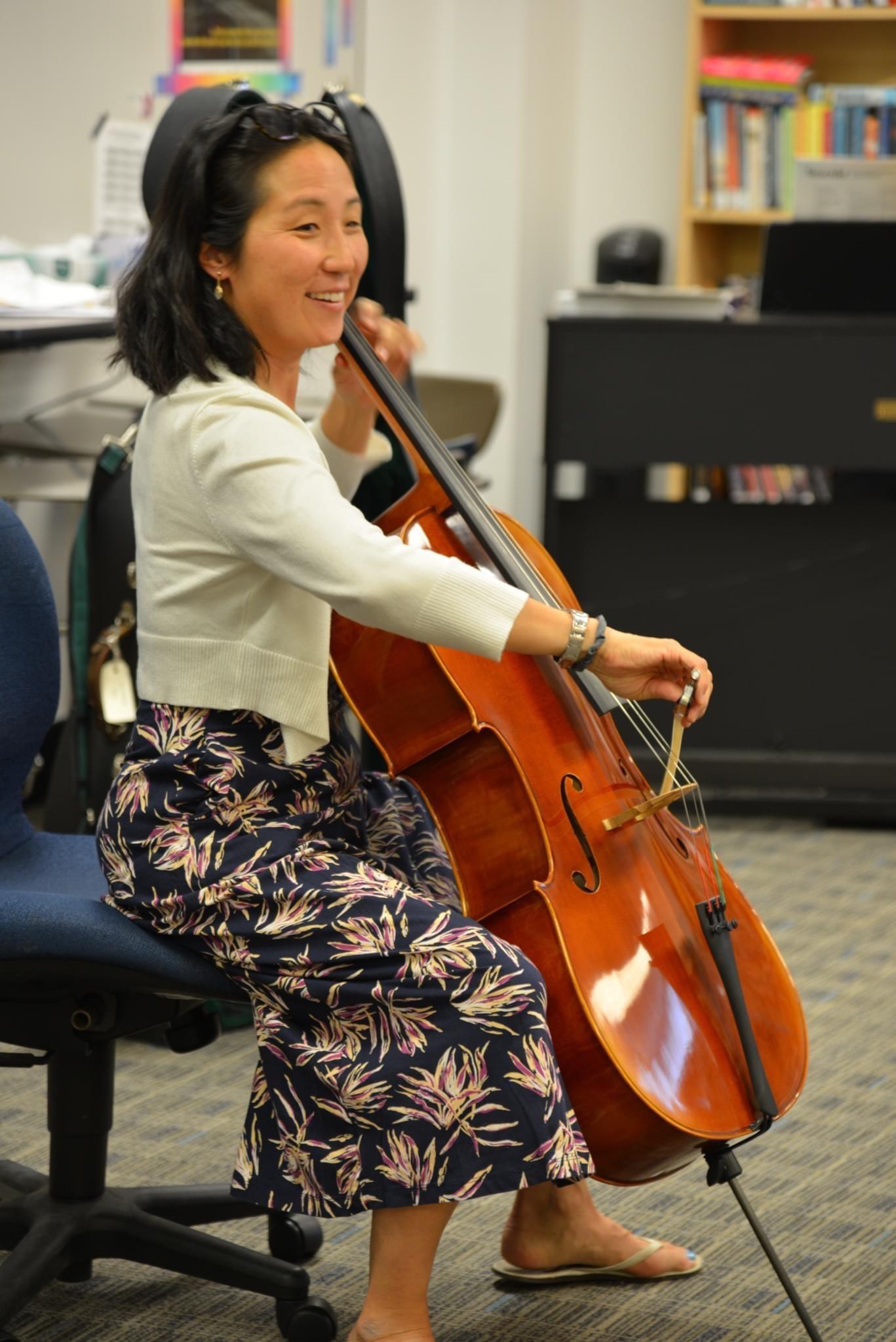 Andrea Yun Asian woman playing cello
