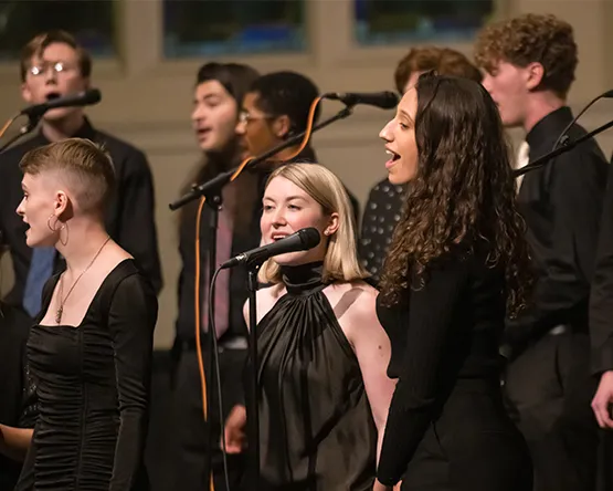 Students singing onstage in Jazz Ensemble