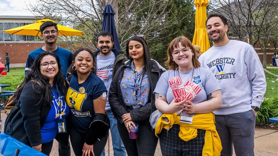A group of Webster students at a campus event.