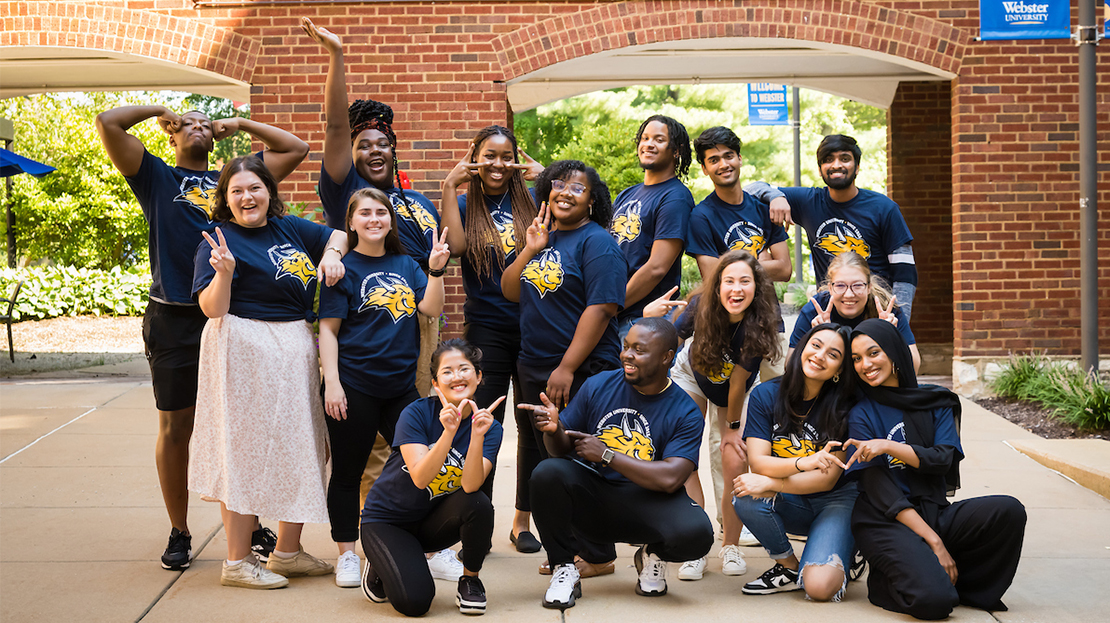 A group of campus leaders pose for a photo.
