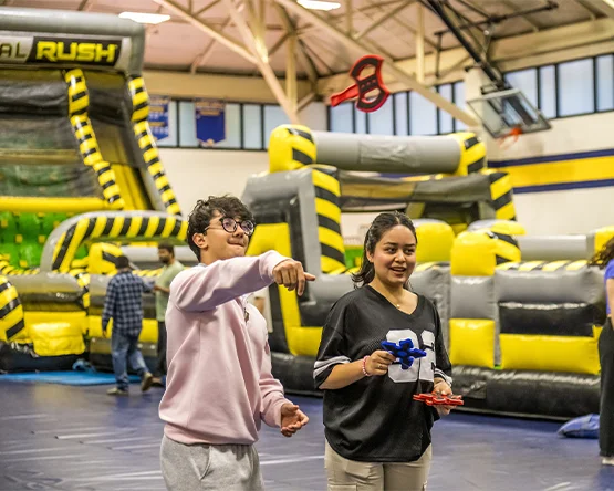 Students enjoying games at a campus event. 