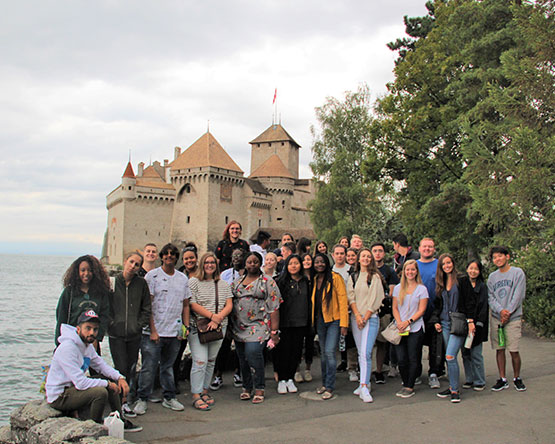 A group of Webster students outside a Chatea in Geneva. 